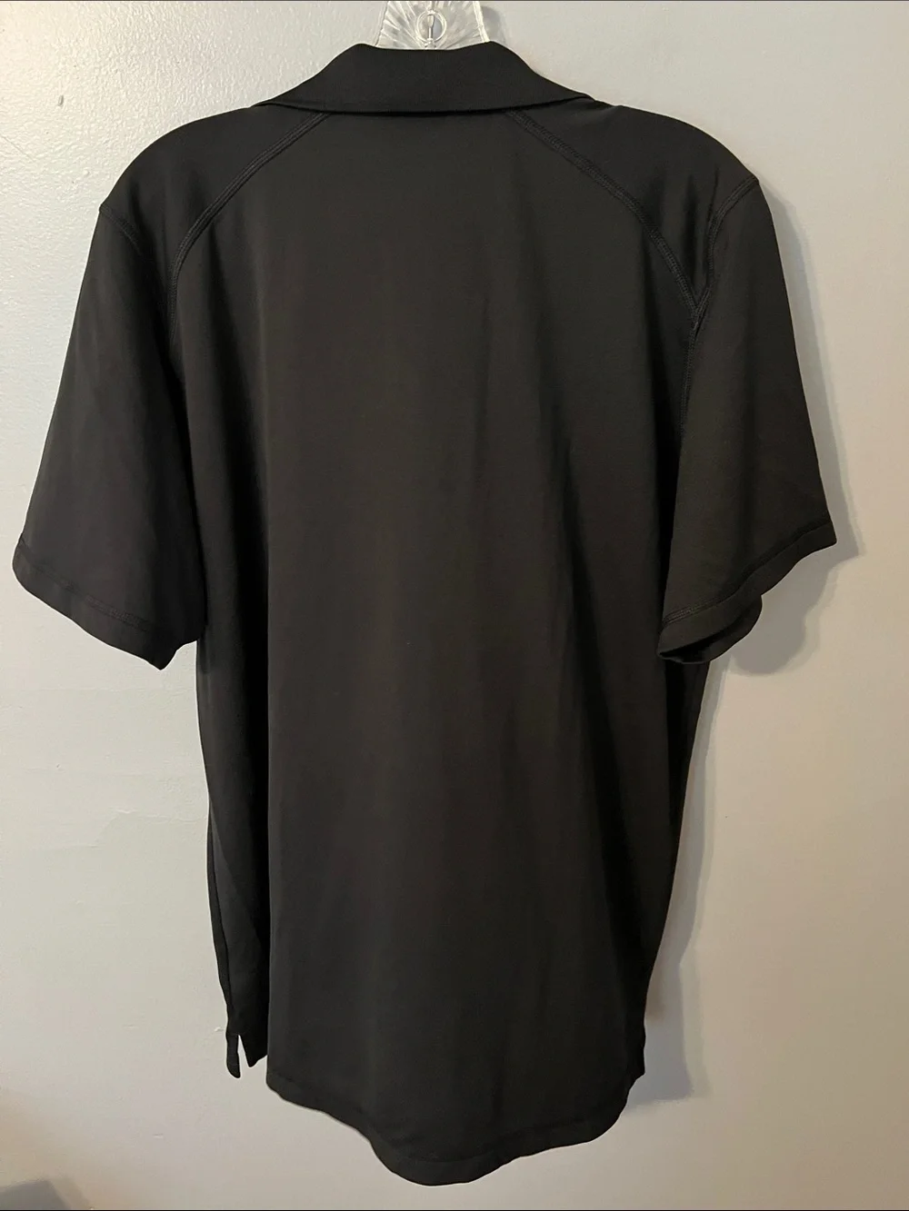 The North Face Black Polo with Red Logo Accent